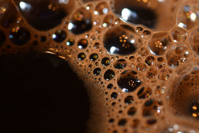 Bubbles in a cup of coffee