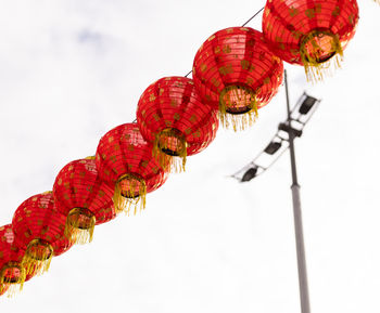 Red chinese lanterns on the background of the sky