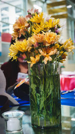 Close-up of flowers in vase on table