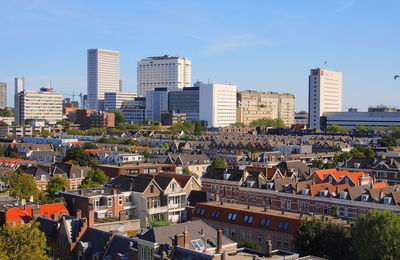 High angle view of buildings in city against sky