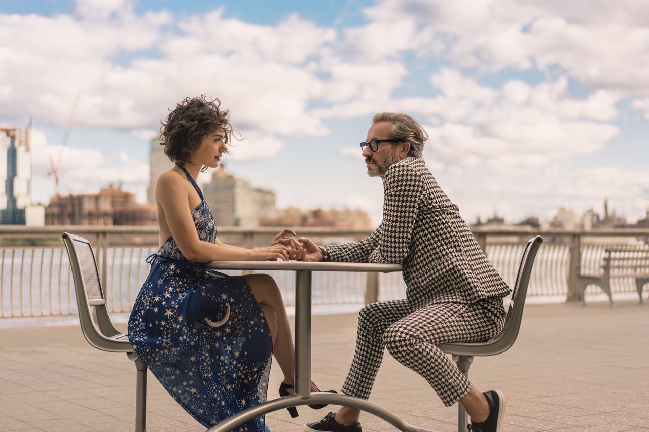 two people, leisure activity, real people, casual clothing, sitting, day, sky, togetherness, outdoors, childhood, side view, young women, cloud - sky, young adult, built structure, focus on foreground, transportation, lifestyles, happiness, bonding, building exterior, nature