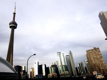 View of buildings in city against sky