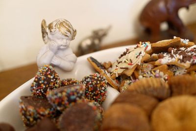 Gingerbread cookies with figurine on plate