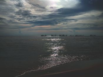 Scenic view of sea against sky at sunset