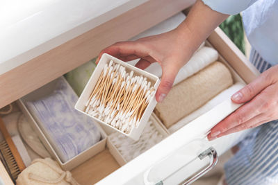 Cropped hands of person working on table