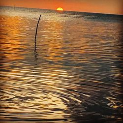 Scenic view of sunset over sea