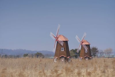 Built structure on field against clear sky