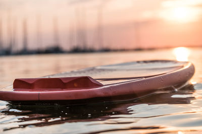 Close-up of boat on lake