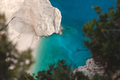 High angle view of rock formation in sea