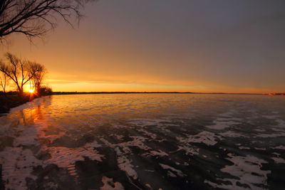 Scenic view of sunset over sea