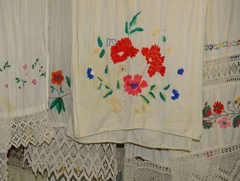 Close-up of white curtain hanging at home