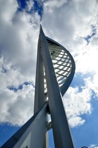 Low angle view of building against cloudy sky