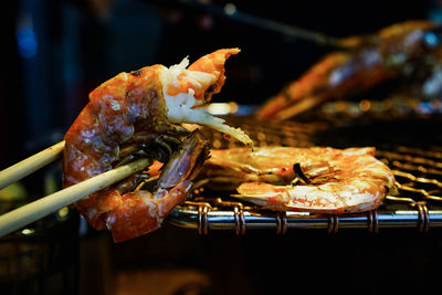 Close-up of crab on barbecue