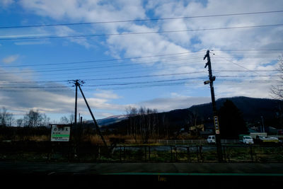 Electricity pylon against sky