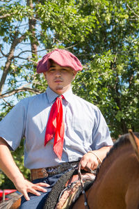 Young man wearing traditional argentinian clothing