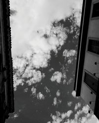 Close-up of building against cloudy sky