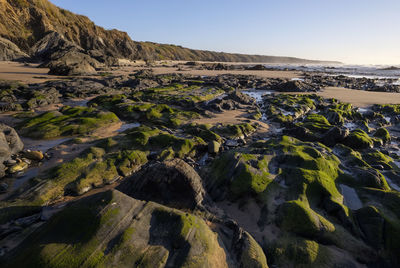 Scenic view of rocks against sky