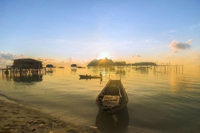 Scenic view of sea at sunset