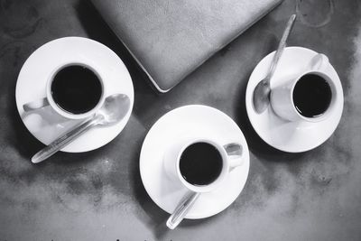 High angle view of coffee cup on table