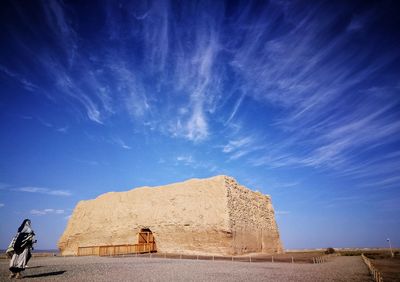 View of a desert against blue sky