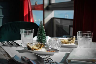 Close-up of food with drinks served on table in restaurant