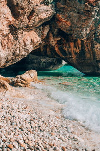 Scenic view of rocky beach