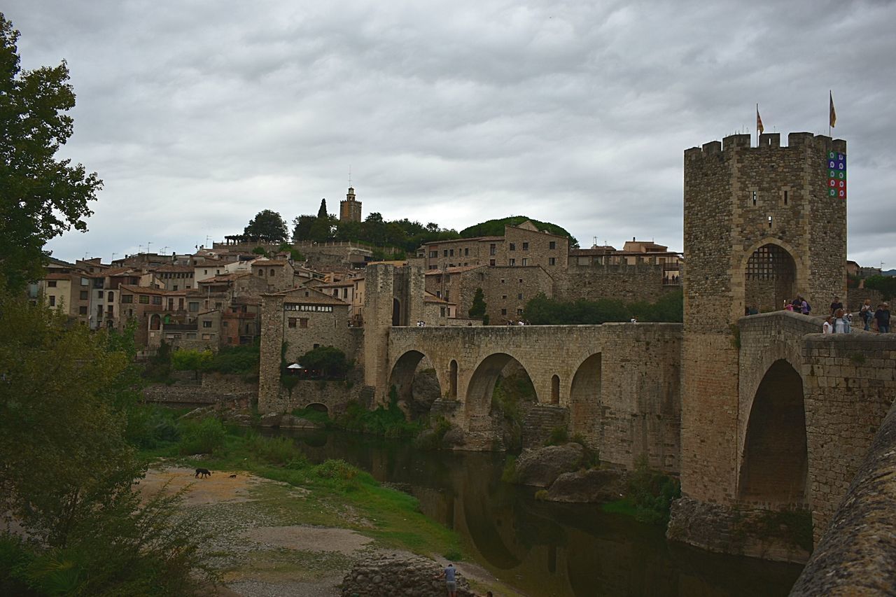 VIEW OF CASTLE AGAINST CLOUDY SKY