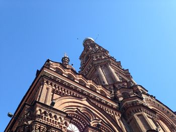 Low angle view of historic building against clear sky