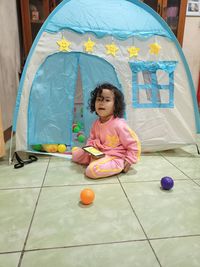 Rear view of people in tent