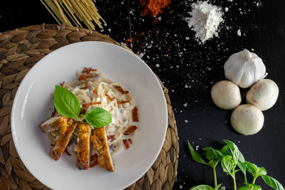 High angle view of vegetables in plate on table