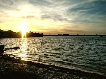 Sun shining over sea