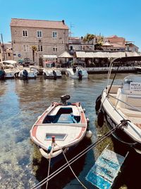 Boats moored in canal