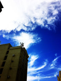 Low angle view of building against blue sky