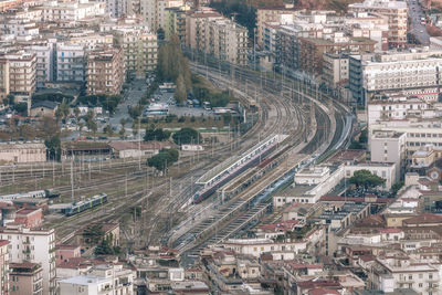 High angle view of street amidst buildings in city