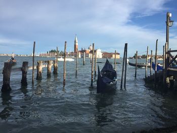 Boats moored in sea