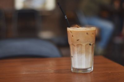 Close-up of iced coffee on table