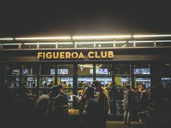 Group of people waiting at airport