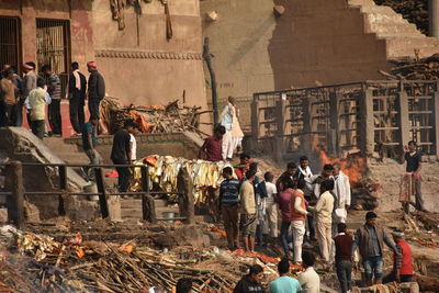 Group of people working in market