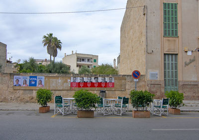 View of street and buildings against sky