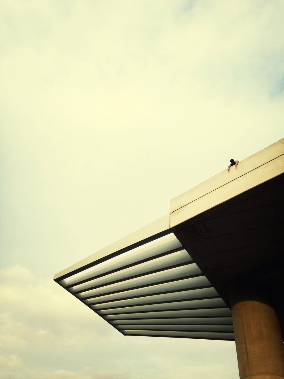 low angle view, architecture, built structure, building exterior, sky, tall - high, tower, modern, skyscraper, travel destinations, city, clear sky, outdoors, famous place, tall, international landmark, office building, day, cloud - sky, no people