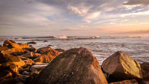 Scenic view of sea against sky during sunset