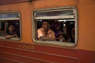 Portrait of people in train