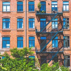 Fire escape on brick wall of apartment building