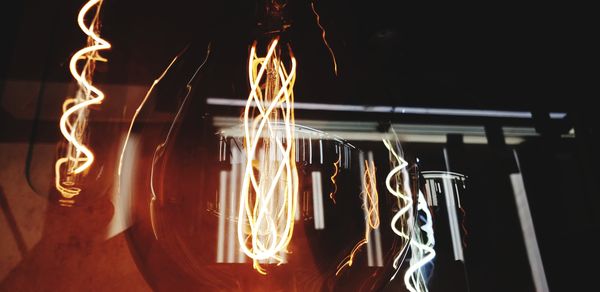 Close-up of illuminated fire at night