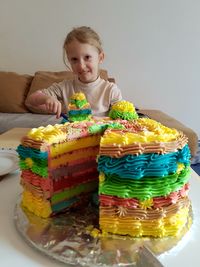 Portrait of man holding cake