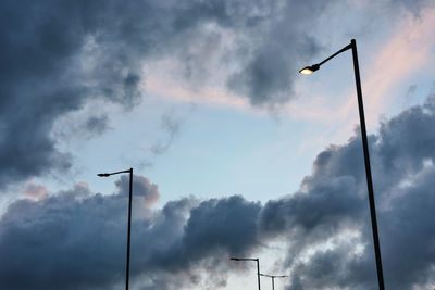 Low angle view of street light against sky