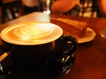 Close-up of coffee cup on table