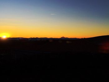 Scenic view of landscape at sunset