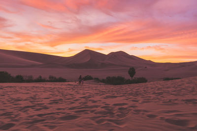 View of desert against scenic sky