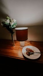 Flower vase on table